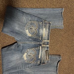 Woman’s rock revivals excellent condition no missing buttons or letters on tag